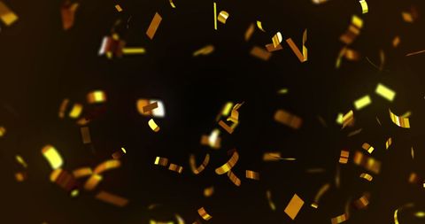golden confetti falling against dark background - Download Free Stock Images Pikwizard.com