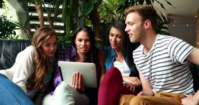 Diverse Group of Friends Gathering and Watching Tablet - Download Free Stock Images Pikwizard.com