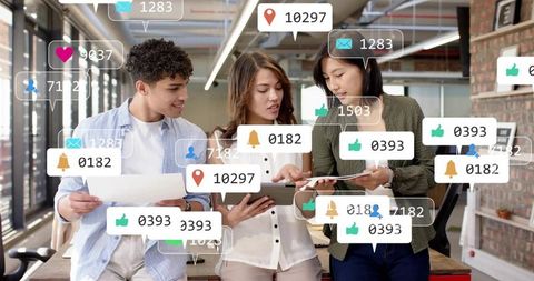 Team collaborating on social media analytics with notification overlays in modern open office