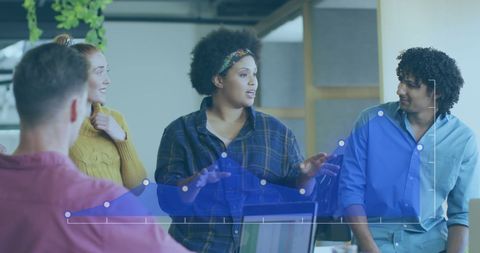 Team Analyzing Data Visualizations in Modern Office Environment