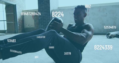 Man Engaging in Core Workout with Medicine Ball Numbers