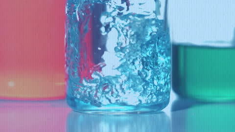 Animated Glitch Over Reagent and Lab Glass on Blue Background