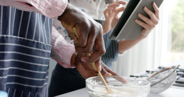 Close-Up of Hands Baking and Using Digital Tablet in Kitchen - Download Free Stock Images Pikwizard.com