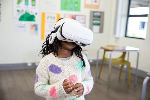 Child Engaging with Virtual Reality Technology in Classroom Setting