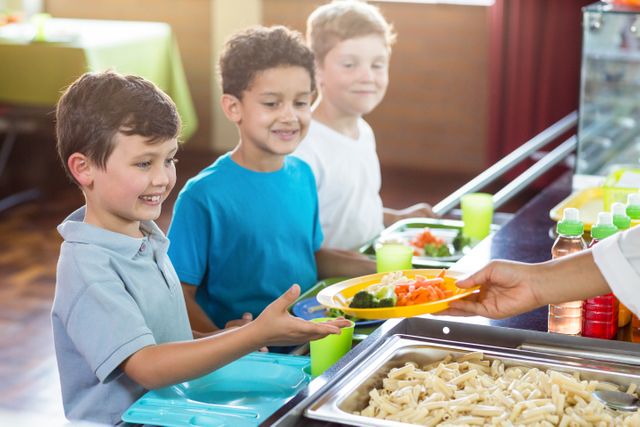 Children Receiving Healthy Lunch in School Cafeteria - Download Free Stock Photos Pikwizard.com