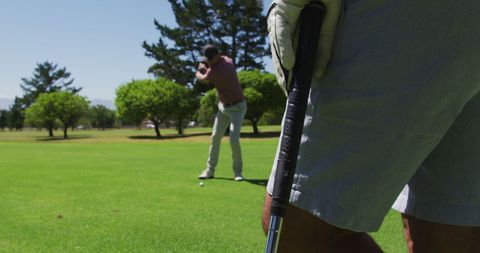 Senior Man Practicing Golf Swing on Sunny Day - Download Free Stock Images Pikwizard.com