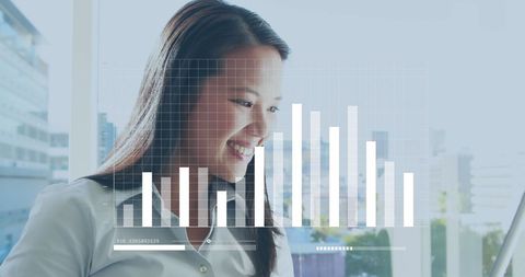 Businesswoman Analyzing Data with Digital Graph Overlay in Modern Office