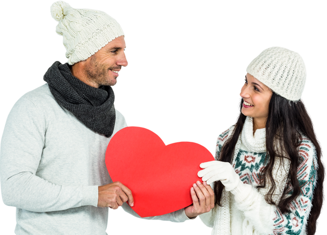 Smiling Couple Holding Heart Cutout Dressed for Winter Transparent Background - Download Free Stock Videos Pikwizard.com