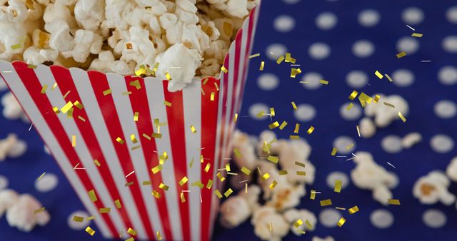 Golden Confetti Over Retro Popcorn Box Celebrating Movie Night - Download Free Stock Images Pikwizard.com