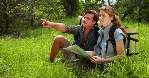 Couple Navigating Hiking Trail with Map Outdoors - Download Free Stock Images Pikwizard.com