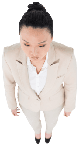 Transparent Image of Serious Asian Businesswoman in Beige Suit