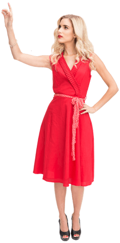 Elegant Blonde Pointing in Red Dress Seen on Transparent Background