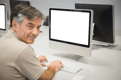 smiling mature man using computer at office with transparent screen - Download Free Stock Videos Pikwizard.com