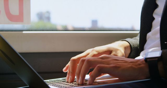 Businessman Working on Laptop During Train Commute - Download Free Stock Images Pikwizard.com