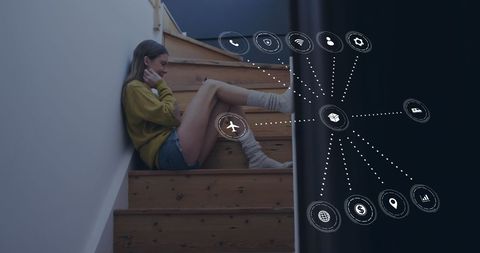 Woman on Stairs Surrounded by Digital Connectivity Hub Icons