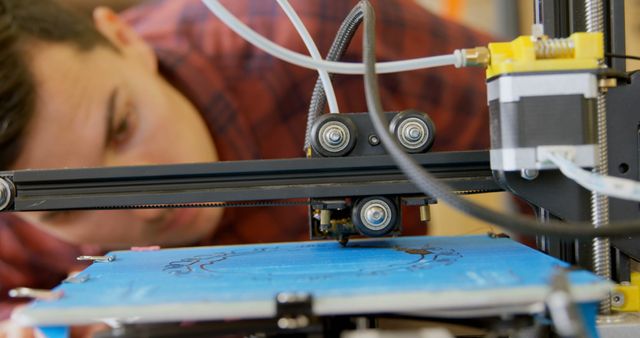 Focused Technician Monitoring 3D Printer Operation - Download Free Stock Images Pikwizard.com