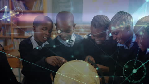 African American Students Exploring Globe with Technology