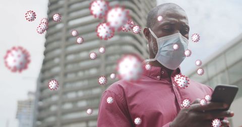 Senior man outdoors with mask and phone amid covid-19 cells