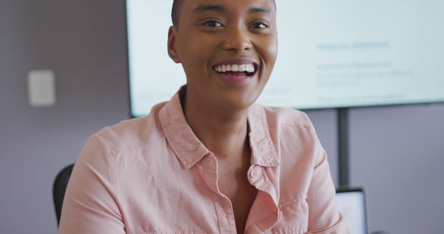 Smiling Businesswoman in Stylish Office Setting - Download Free Stock Images Pikwizard.com