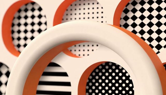 Curving off-white ring framing orange-rimmed circular patterns polka dot checkerboard