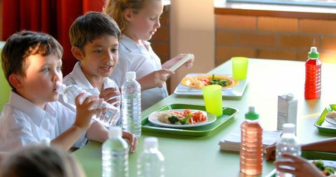 Children Enjoying Healthy School Lunch in Cafeteria - Download Free Stock Images Pikwizard.com