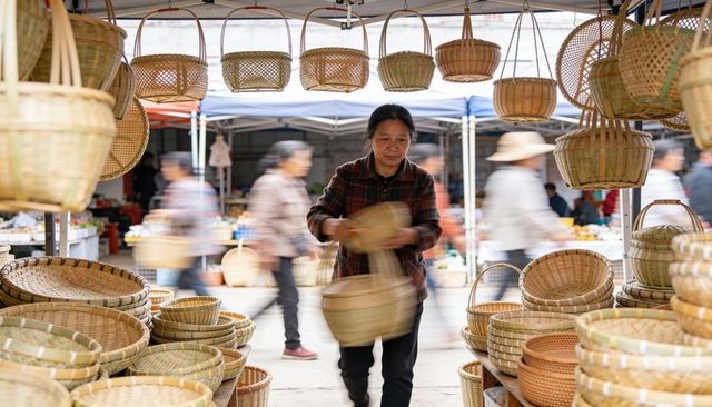 Market vendor arranging woven baskets under canopy, artisan stall bustle and handcrafted ware