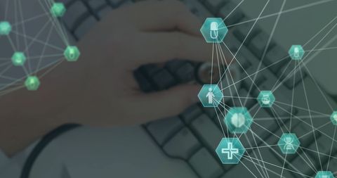 Hand Operating Keyboard Among Digital Medical Icons