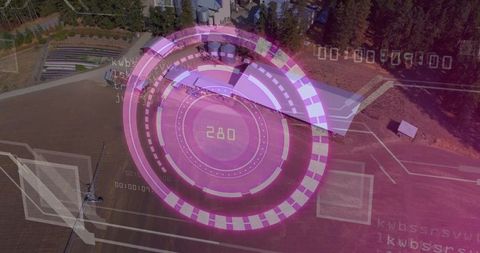 Futuristic digital interface overlaid on industrial landscape