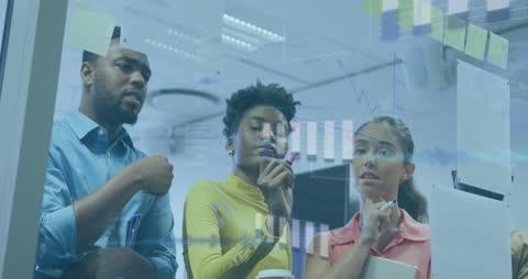 Diverse Team Analyzing Financial Data through Transparent Screen