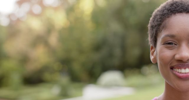 Close up of Smiling African American Woman Outdoors - Download Free Stock Images Pikwizard.com