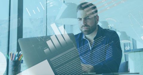 Focused Businessman Analyzing Digital Financial Data - Download Free Stock Images Pikwizard.com