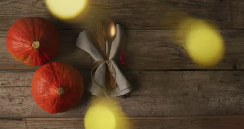 Festive Autumn Table Setting with Pumpkins and Cutlery