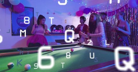 Playing pool at neon birthday party with friends, balloons and retro lounge vibe