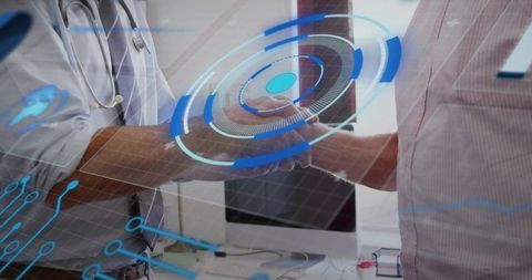 Doctor shaking hands with patient as holographic medical interface displaying diagnostics