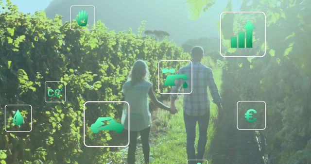 Image of digital eco and green energy icons over people holding hands on field. global environment, green energy and digital interface concept digitally generated image.