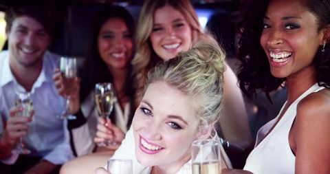 Joyful Celebration in Limousine with Champagne Toast - Download Free Stock Images Pikwizard.com