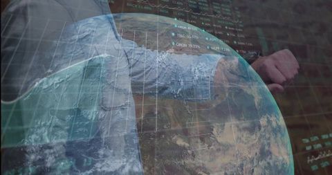 Businessman with Holographic Globe and Stock Market Data