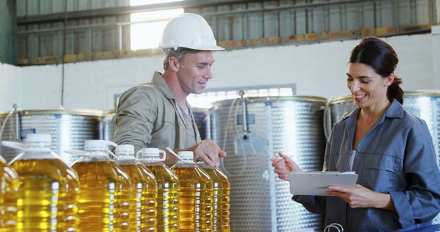 Engineers Checking Oil Production Quality Control in Factory - Download Free Stock Images Pikwizard.com