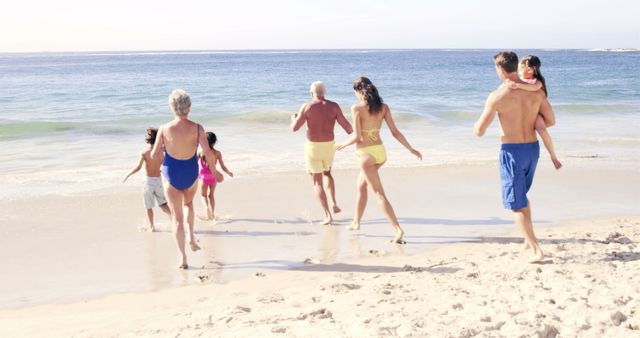 Happy Multigenerational Family Enjoying Time Together on Beach - Download Free Stock Images Pikwizard.com