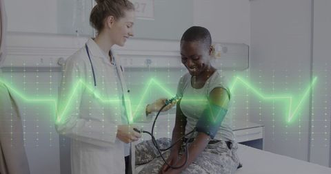 Doctor Taking Blood Pressure of Smiling Female Patient with Digital Overlay