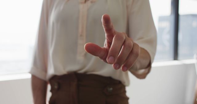 Hand of caucasian businesswoman pointing something in front of her - Download Free Stock Photos Pikwizard.com