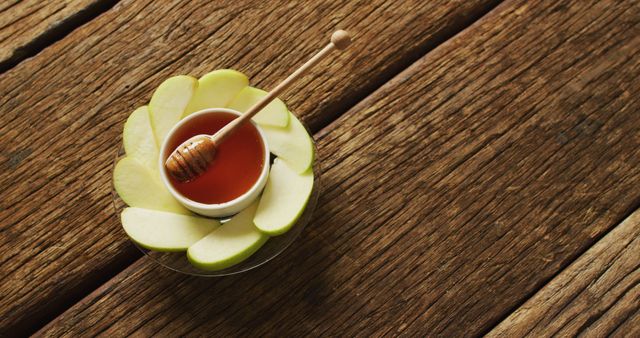 Image of honey in jar and apple slices lying on wooden surface - Download Free Stock Photos Pikwizard.com