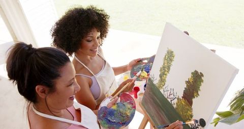Women Painting Together Outdoors in Artistic Exploration - Download Free Stock Images Pikwizard.com