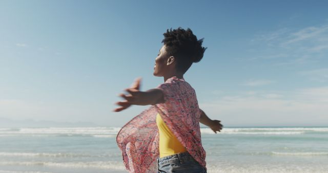 Carefree Woman Enjoying Freedom on Sunny Beach - Download Free Stock Images Pikwizard.com