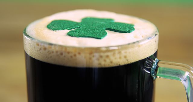 Mug of Dark Beer with Shamrock Decoration on Foam - Download Free Stock Images Pikwizard.com