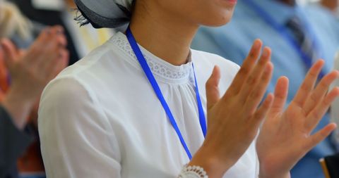 Business seminar audience applauding concept