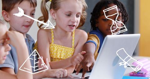 Diverse children engaging with educational technology in classroom