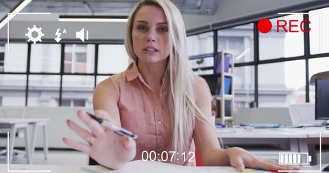 Businesswoman in Office During Video Conference Call