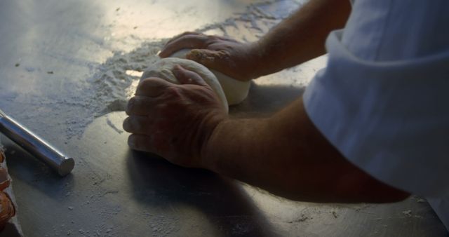 Baker Kneading Dough on Floured Surface - Download Free Stock Images Pikwizard.com