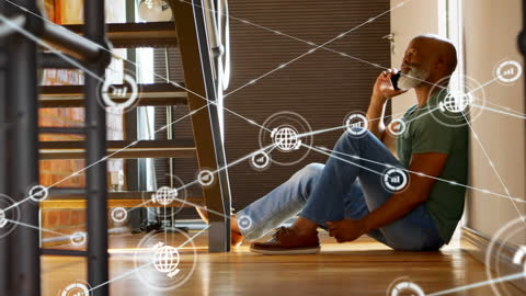 Connected Businessman Talking on Smartphone in Modern Workspace